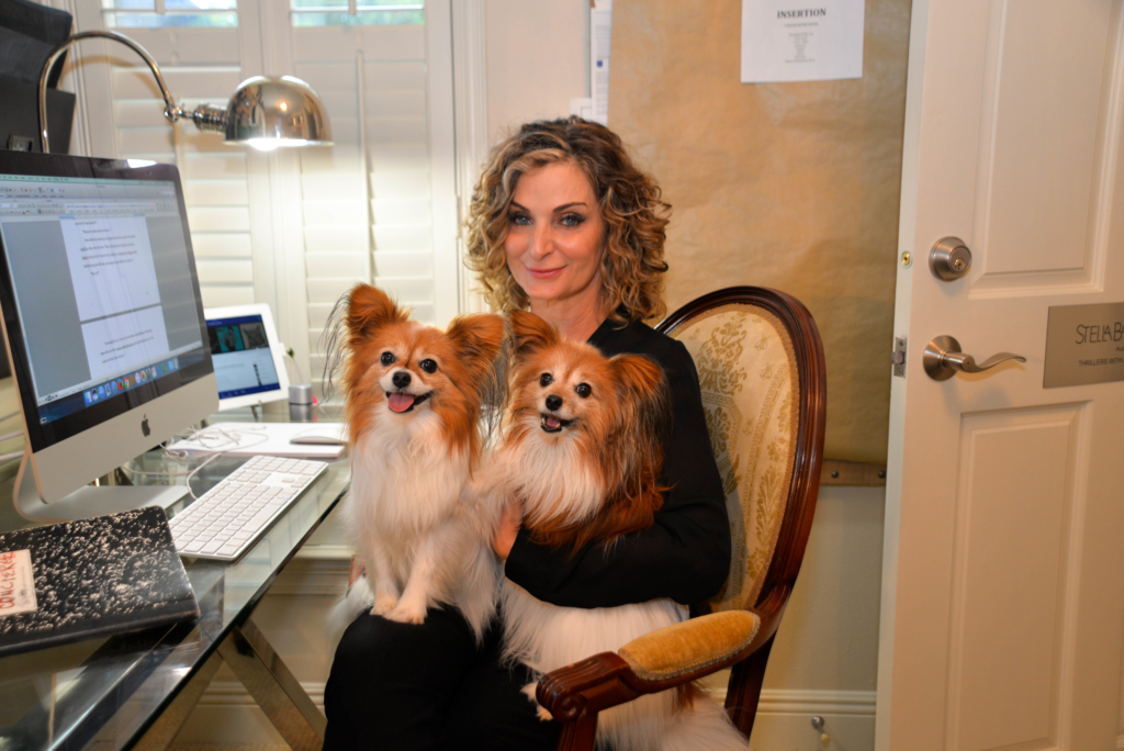 Author of romantic suspense novels, Stella Barcelona, and her pups, Stella and Roux.